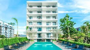 NOON Village Tower 2 & Tower 1 Chalong - Low-Rise Condominium with Pool and Sea Views