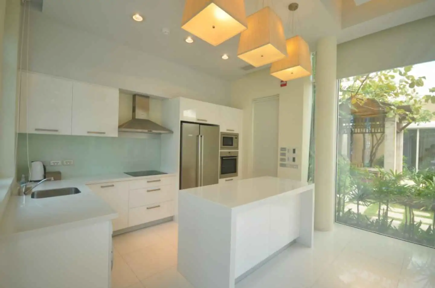 Exterior view of Absolute Beachfront Pool Villa For Sale In Maikhao Beach