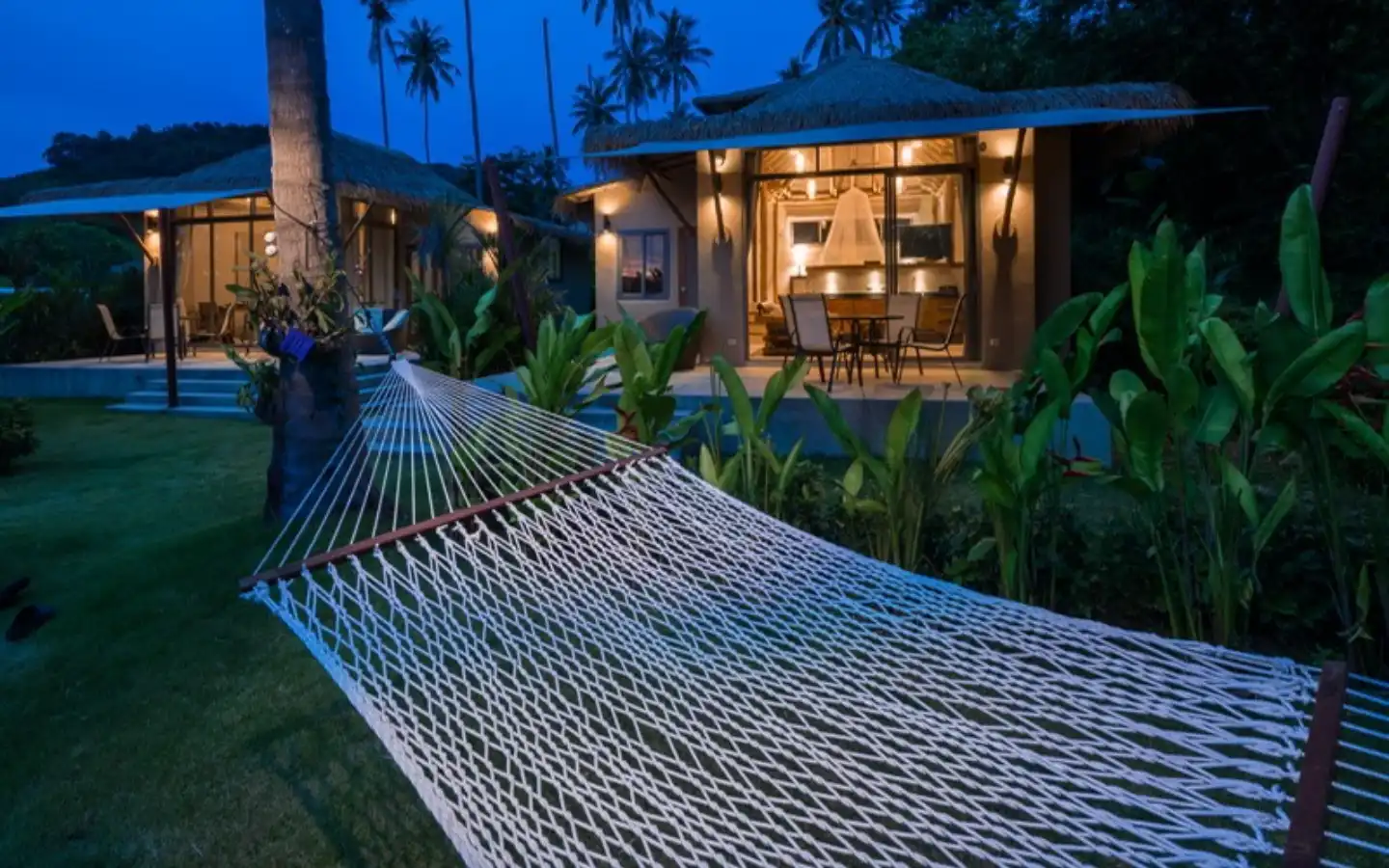 Exterior view of Two Beachfront Bungalows for Sale on Coconut Island - Sold as One