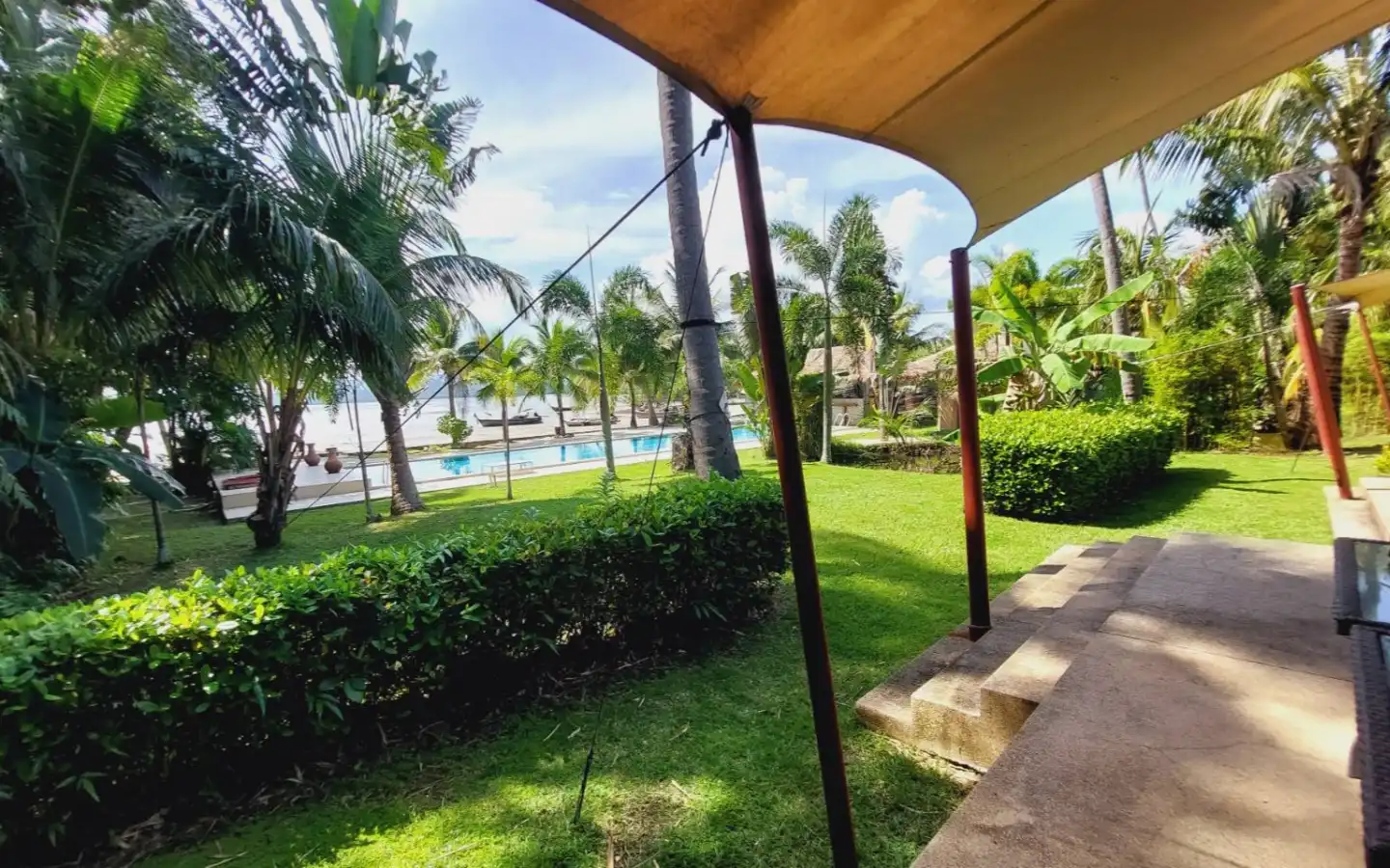 Exterior view of Two Beachfront Bungalows for Sale on Coconut Island - Sold as One
