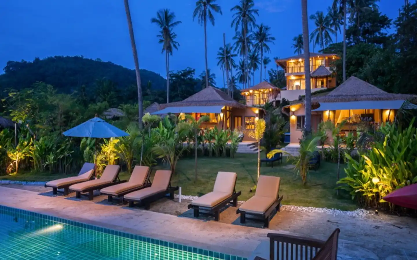 Exterior view of Two Beachfront Bungalows for Sale on Coconut Island - Sold as One