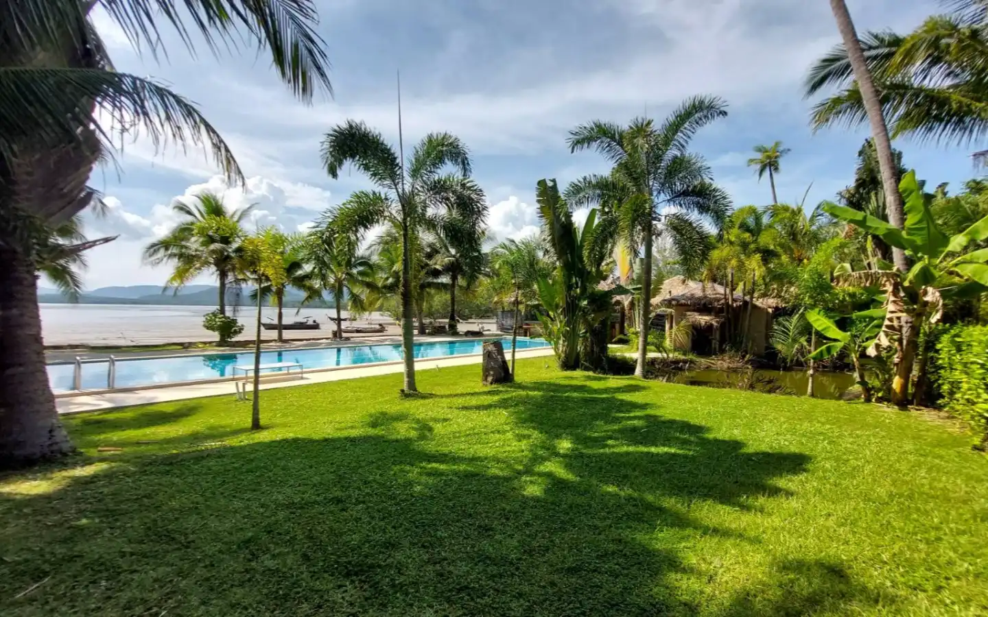 Two Beachfront Bungalows for Sale on Coconut Island - Sold as One